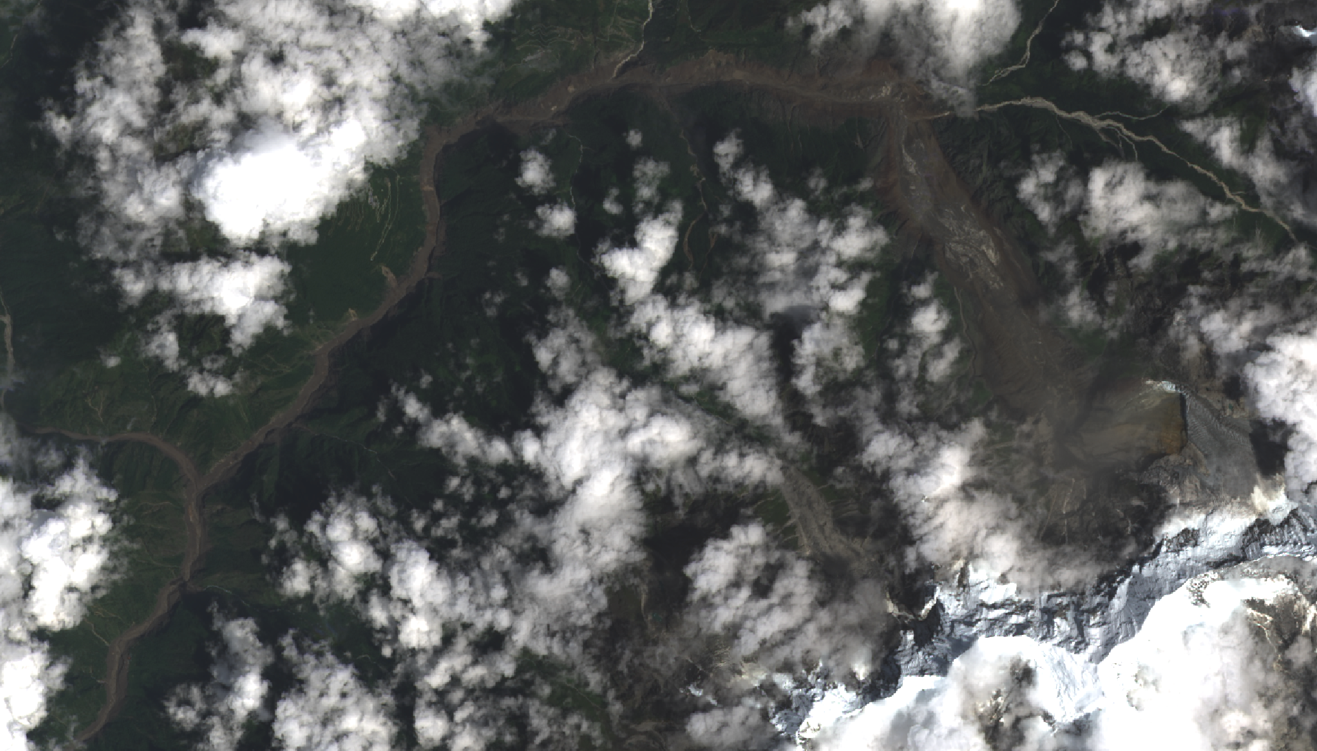Satellite view of the Nepal–Tibet Himalayan flood area after the August 26, 2026 disaster, with cloud cover, mountain valleys and a large scar of displaced earth and ice visible